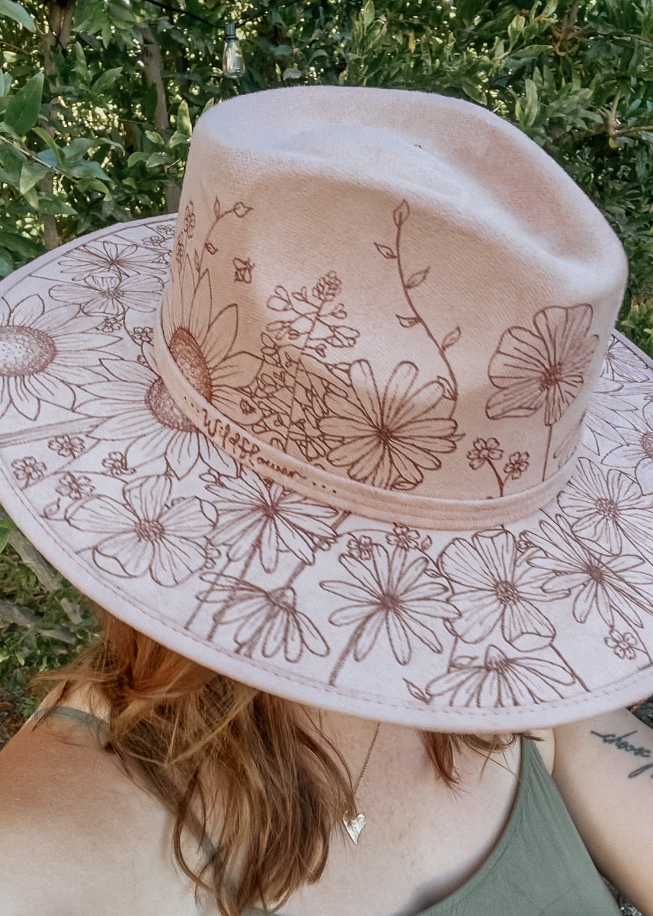 One-of-a-kind hand-burned fedora with wildflowers, butterflies, and bees – July Hat of the Month