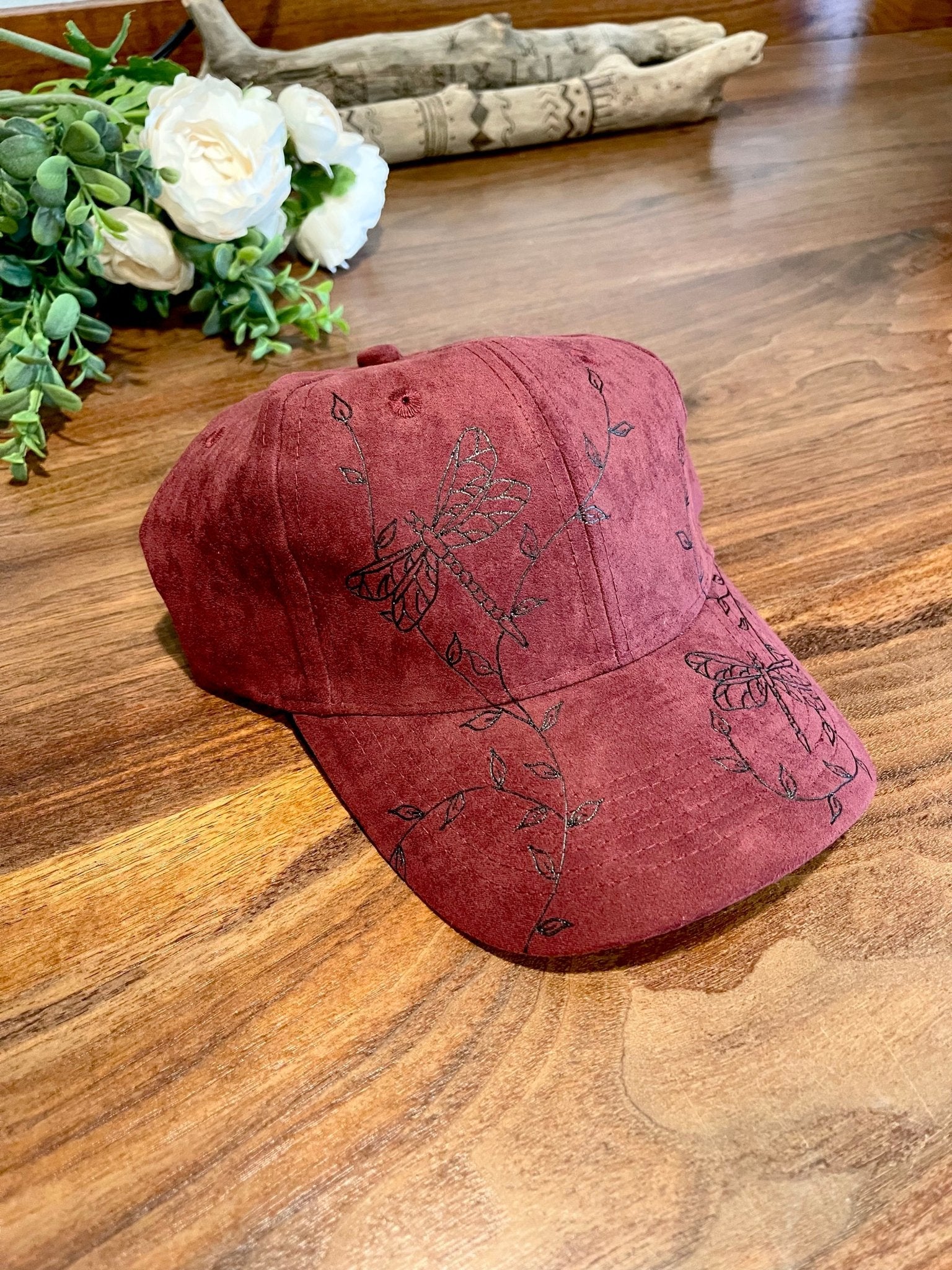 Dragonfly baseball hat shown in burgundy