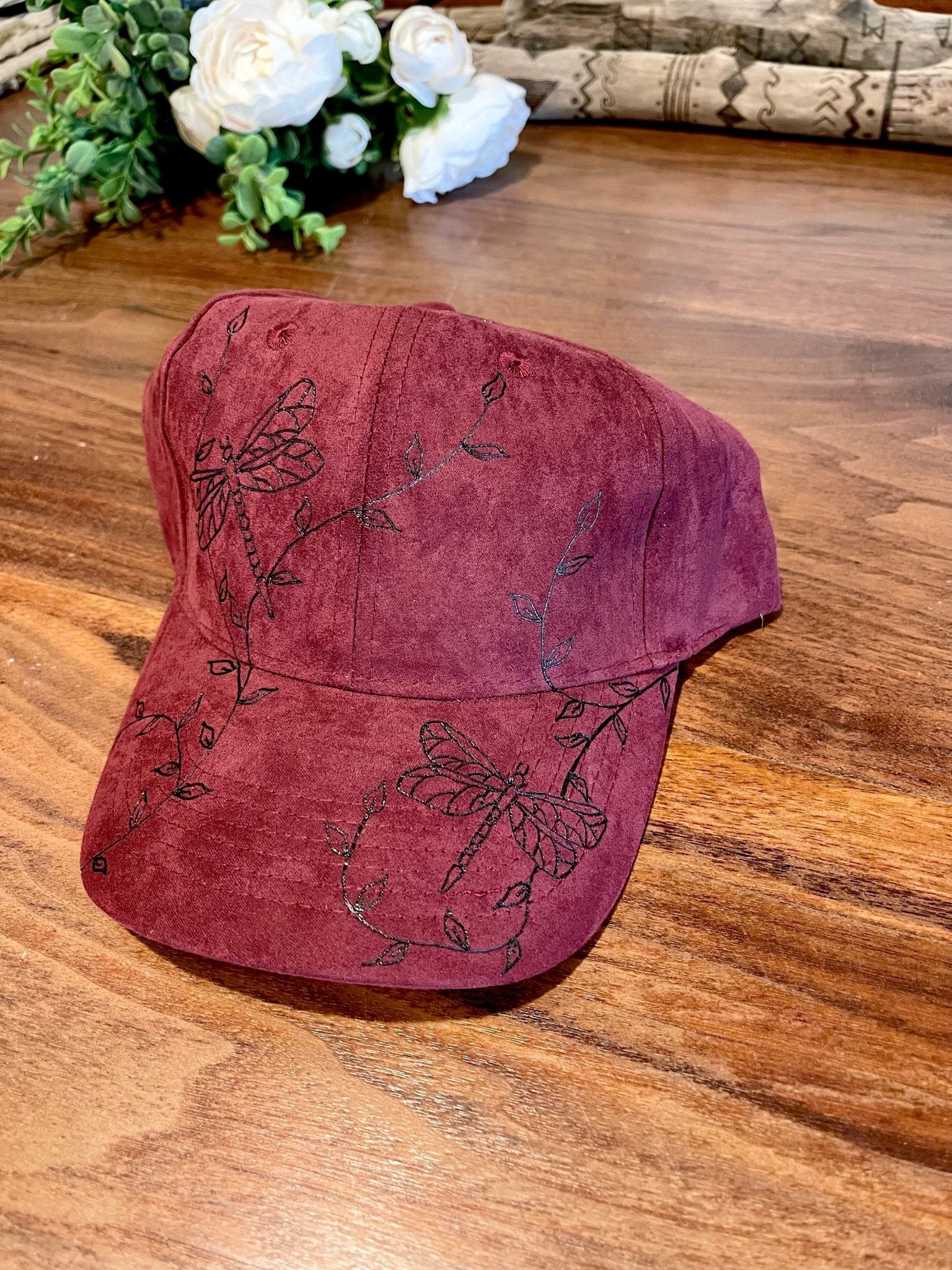 Dragonfly baseball hat shown in burgundy