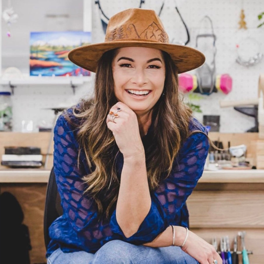 Customer photo with woman wearing a custom, dark brown fedora hat