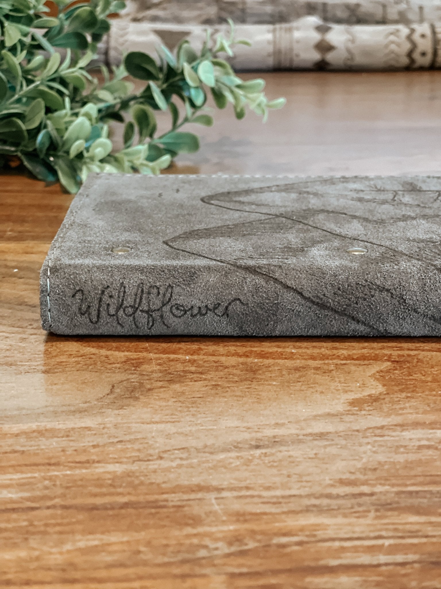 Spine of mountain journal with "wildflower" detail