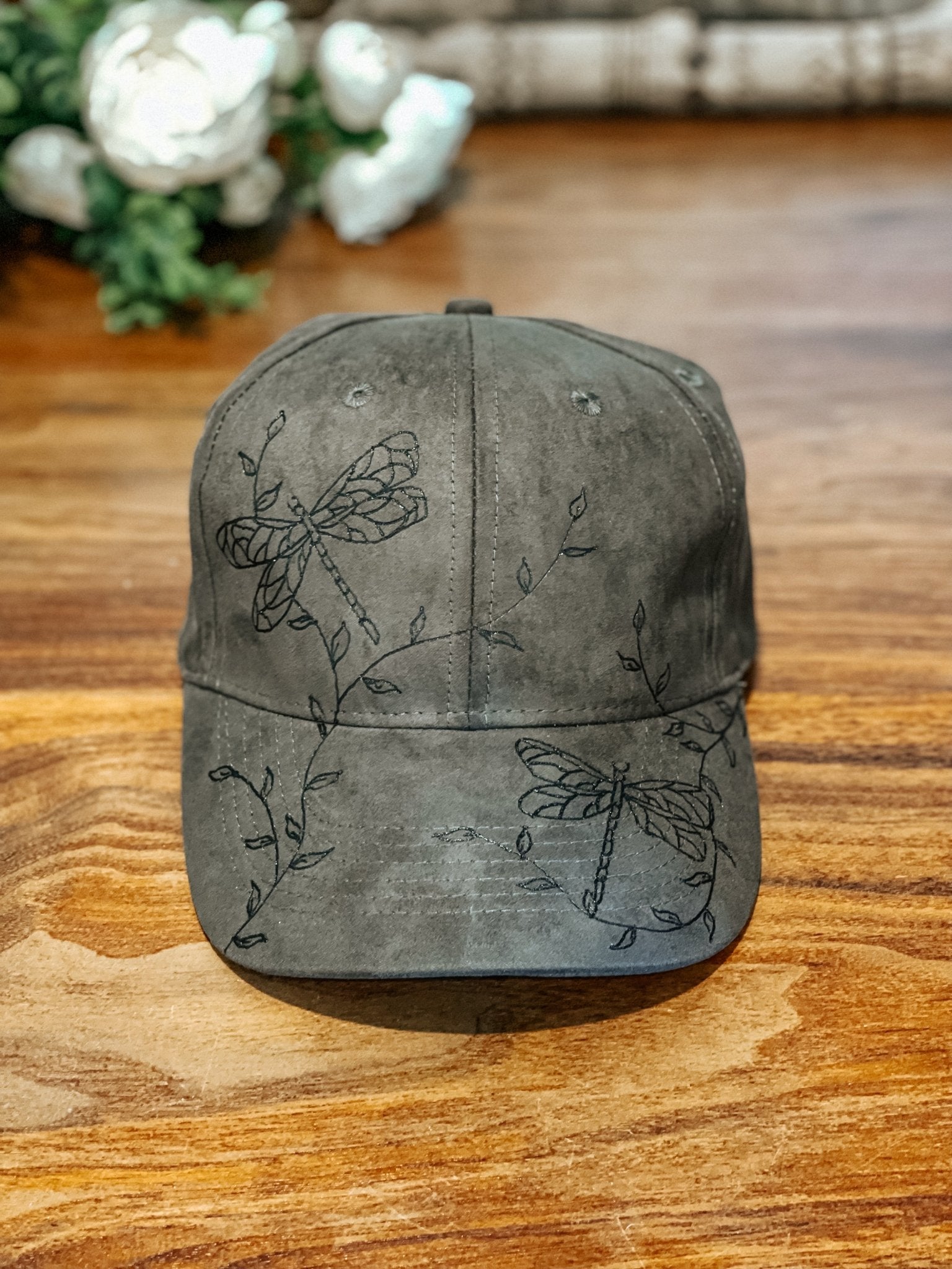 Dragonfly baseball hat shown in olive