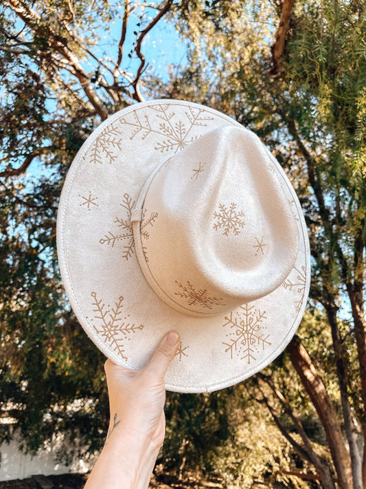Boho holiday hat with snowy design, shown in white