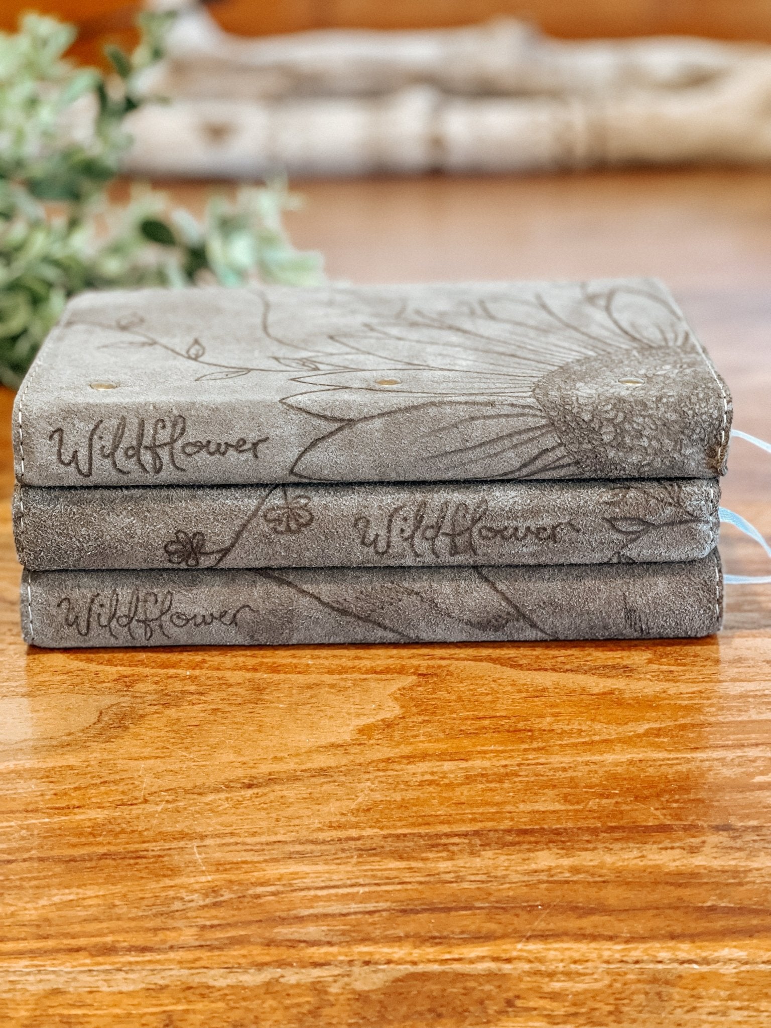 Exterior spine of wildflower journal showing the details added to each one