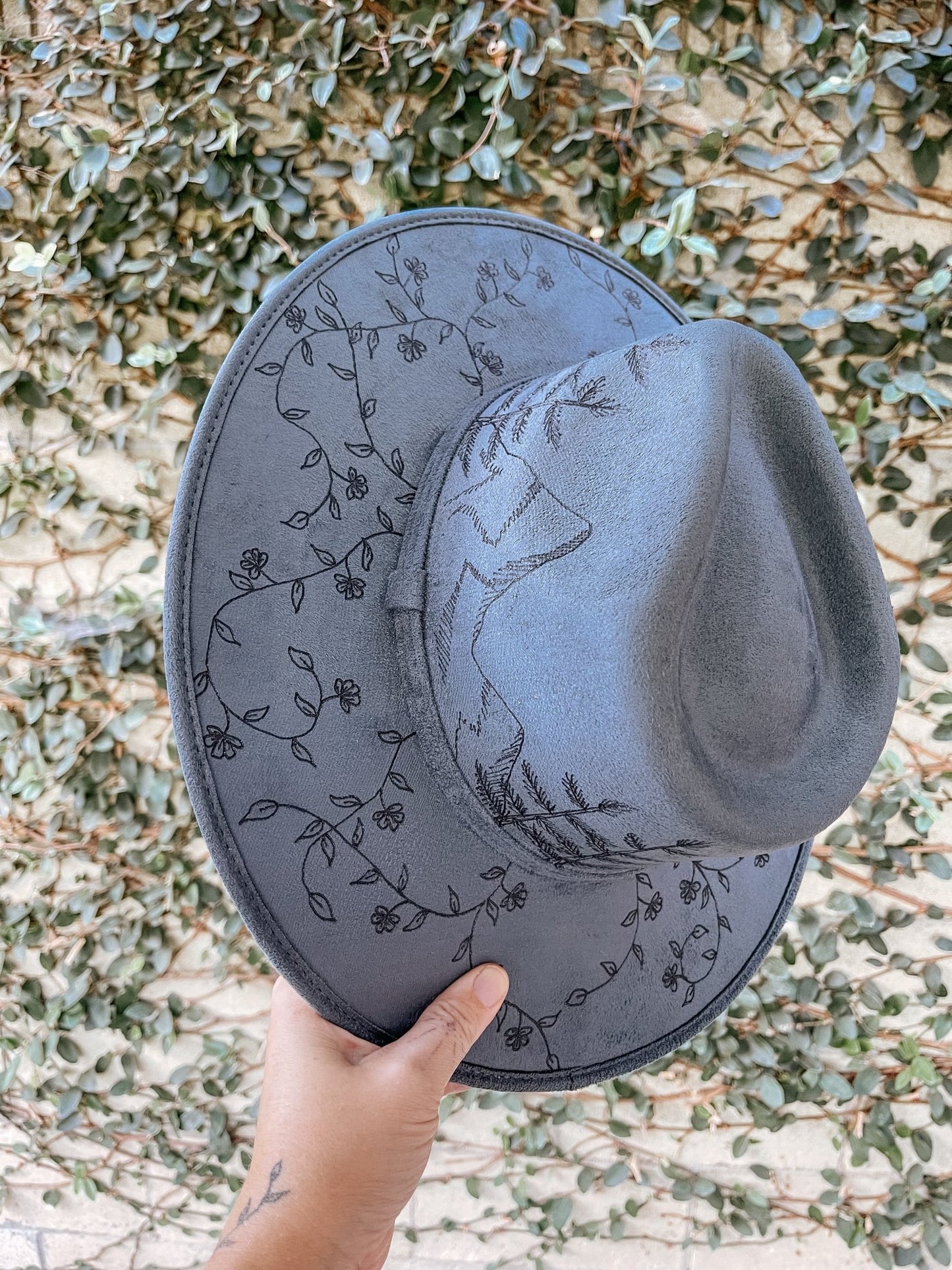 "Wanderer’s Peak" – Hand-Drawn Denim Blue Fedora with Mountain and Wildflower Design