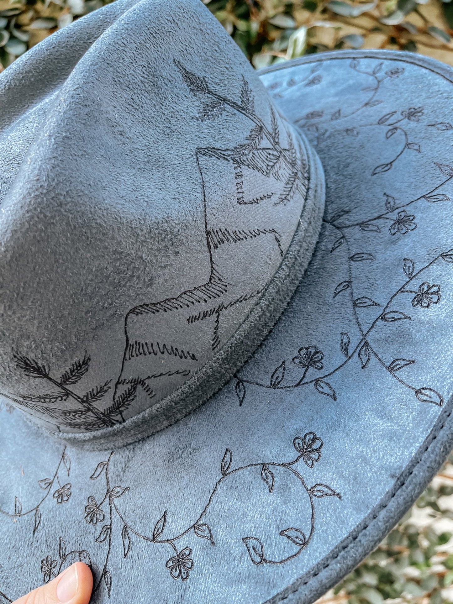 "Wanderer’s Peak" – Hand-Drawn Denim Blue Fedora with Mountain and Wildflower Design