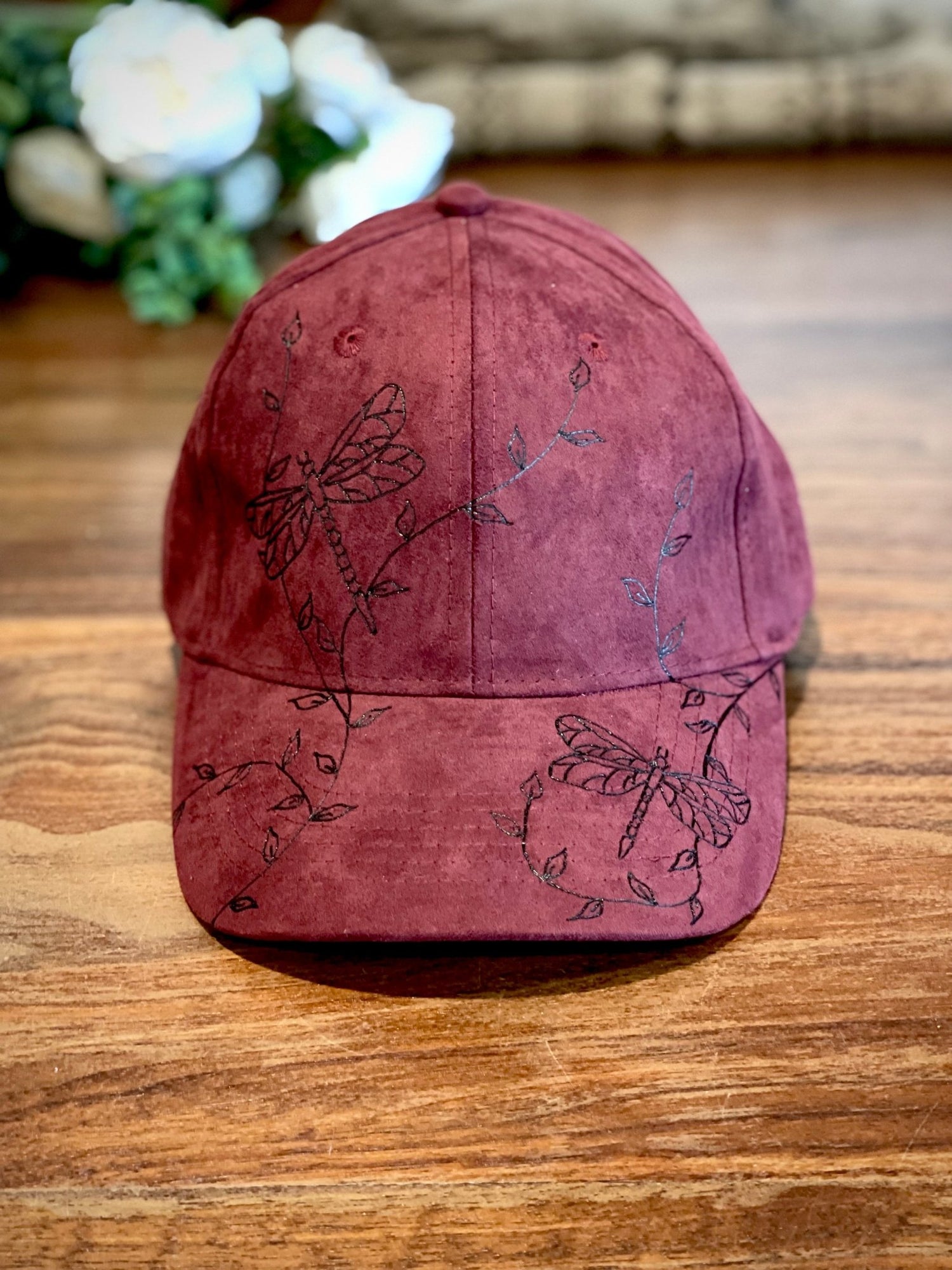 Dragonfly baseball hat shown in burgundy